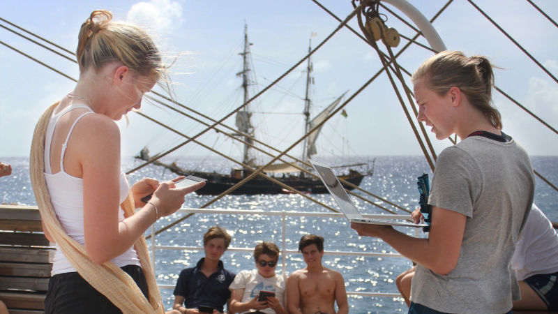 2018-january-09.-ane-and-idun-reading-hamlet-on-boat-deck.-photo-by-stine-bryn-16-9